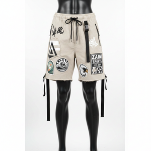 Short de bain homme personnalisé en patchwork, tissu coton épais 300 GSM, détail sangle à boucle, ourlet brut vieilli, beige - Product Image 1