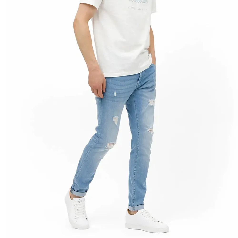 Grosir desainer celana Jeans biru pria robek kurus elastis celana Denim Jin pria ramping di pakistan gaya modis baru streetwear