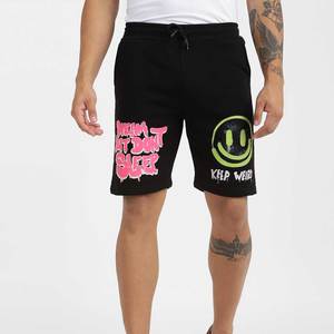Pantalones cortos tipo bermuda de algodón negro para hombre con estampado de sonrisa verde y diseño Pink Dream But Don't Sleep, cintura con cordón informal - Product Image 1
