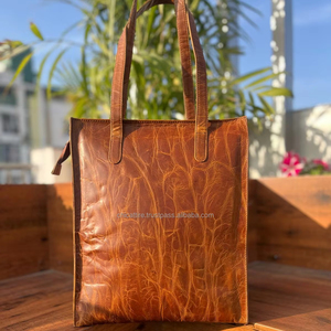 กระเป๋าถือหนังสไตล์ตะวันตกสำหรับผู้หญิงกระเป๋าช้อปปิ้งหนังกระเป๋าเก็บของมีสไตล์ไม่ซ้ำใครกระเป๋าถืออเนกประสงค์ - Product Image 1