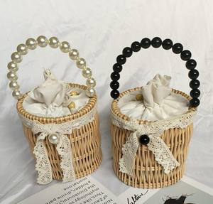 Sacs à main en paille naturelle faite à la main de conception cylindrique avec nœud en ruban de dentelle et sangle en perles pour les femmes à usage quotidien et les voyages d'été à la plage - Product Image 1