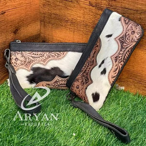 Nouveau élégant vrais cheveux faits à la main sur cacher usiné fourrure cuir bracelet embrayage vente chaude femmes conçu à la main peint pochettes à glissière - Product Image 1