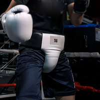 Protège-guêtres durable avec sangles réglables, parfait pour la boxe, le MMA, le karaté et autres sports d'entraînement à fort impact