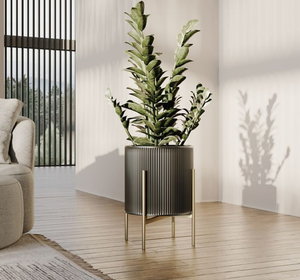 Black ribbed planter, gold geometric <b>stand</b>, modern textured design, elegant floor <b>pot</b>, available at wholesale prices. - Product Image 1