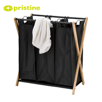 Panier à linge double pliable minimaliste avec cadre métallique en toile noire pour organiser les vêtements, à utiliser dans la cuisine ou la salle de bain