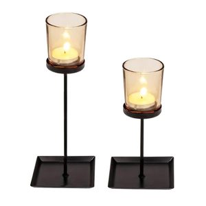 Set di 2 portacandele a colonna in metallo nero 17/22cm con luce da tè decorativa in vetro color ambra per la luce del tè per la casa di nozze - Product Image 1