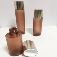 Botellas de embalaje cosmético de oro ámbar para champú de crema corporal y cuidado de la piel-Juego de varias capacidades de diseño esmerilado con tapa de pulverización de bomba PETG