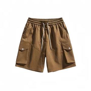 Pantalones cortos deportivos activos para hombre de poliéster de verano a precio barato de fábrica, pantalones deportivos informales con logotipo personalizado de Color sólido, teñidos lisos - Product Image 3