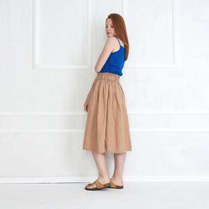 Mini jupe en lin pour dames Nouveau design Taille haute asymétrique Kaki tissé avec taille naturelle OEM personnalisable Drop Shipping - Product Image 3