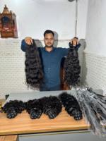 Extensions de cheveux humains vierges indiennes naturelles ondulées Remy 100% brutes non traitées vendues par le fournisseur
