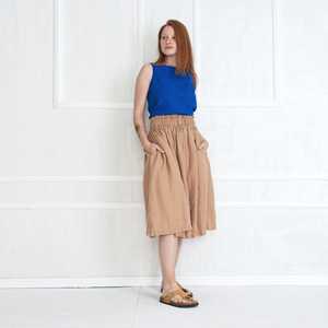 Mini jupe en lin pour dames Nouveau design Taille haute asymétrique Kaki tissé avec taille naturelle OEM personnalisable Drop Shipping - Product Image 4