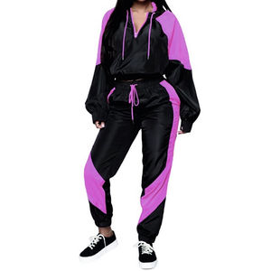 ชุดวอร์มกันลมออกแบบได้ตามต้องการสำหรับผู้หญิงชุดเสื้อครอปแบบมีซิปผ้าไนลอนน้ำหนักเบาเย็บปะติดปะต่อกัน2ชิ้นล่าสุด - Product Image 5