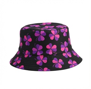 Sombrero tipo pescador unisex azul con estampado floral amarillo y naranja para uso casual en la playa en verano - Product Image 1