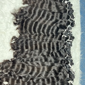 Paquete al por mayor de trama de cabello Remy ondulado negro natural cutícula alineada textura caliente trama doble en estilo rizado origen vietnamita - Product Image 3