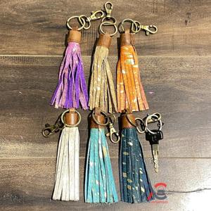 Nouveau vrai cheveux métalliques faits à la main sur cacher cuir de fourrure mignon charmant arc-en-ciel couleur gland porte-clés Style occidental Multi moderne porte-clés - Product Image 1