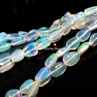 Perles de pierres précieuses de forme ovale lisse en opale éthiopienne naturelle, pépites AAA en opale de feu multiple, perles ovales en opale Welo pour bijoux de collier