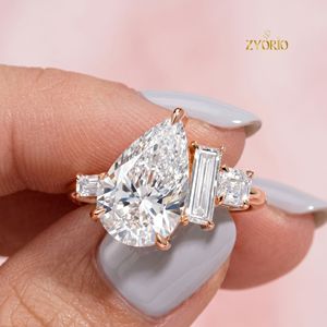 Anillo de compromiso llamativo de plata de ley 925 con tres piedras de corte pera, diamante cultivado en laboratorio, joyería nupcial - Product Image 3