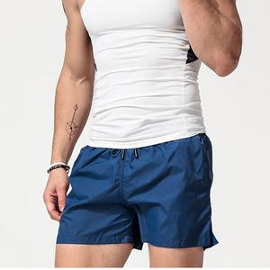 กางเกงขาสั้นแห้งเร็วเป็นมิตรกับสิ่งแวดล้อมสำหรับผู้ชายเอวยางยืดแบบลำลองระบายอากาศได้ดีสีพื้นแบบกำหนดเอง100% - Product Image 4