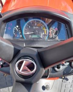 Tracteur Kubota BX-23S d'occasion avec tondeuse, pelle rétrocaveuse et chargeur frontal, équipement agricole à vendre - Product Image 4