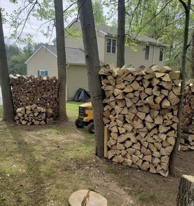 Hardwood Firewood <b>Logs</b> Stacked Outdoor Ready For Heating And Cooking Use. - Product Image 1