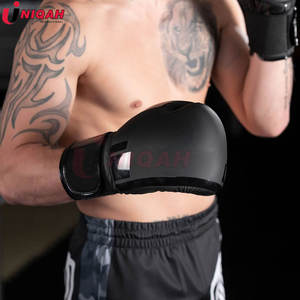 Gants de boxe en cuir de vachette évacuant l'humidité avec logo personnalisé en gros équipement d'entraînement pour le kickboxing Arts martiaux UNIQAH - Product Image 4