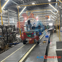 Konveyor Rantai Slat Otomatis Berkualitas Tinggi untuk Lini Perakitan Kendaraan Roda Tiga, Baja Lunak Kapasitas 3-4 Ton, Pemasok India, Pembelian Grosir