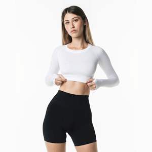 Chemise à manches longues sans couture pour femme, 51% Polyamide, 38% Polyester, 11% élasthanne, encolure ras du cou, taille Raglan, blanche - Product Image 1