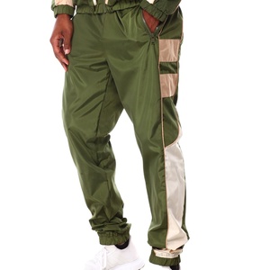 ชุดวอร์มผ้าไนลอนกันลมสำหรับผู้ชายชุดวอร์มผ้าไนลอนกันน้ำแบบออกแบบโลโก้ได้ตามที่ต้องการมีคุณภาพดีบริการ OEM ODM - Product Image 2