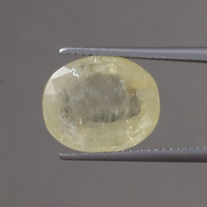 พลอยแซฟไฟร์สีเหลืองสดใสทรงหลวมขนาด13.5X11.5มม. ทรงรีตัด10.82กะรัต IGI ได้รับการรับรอง100% การแว็กซ์แสงสีธรรมชาติ - Product Image 1