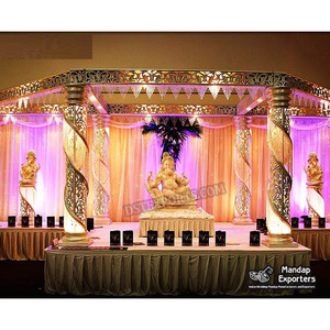 รูปปั้นพระพิฆเนศสำหรับงานแต่งงานสไตล์ฮินดูที่มีคลาสแมนดาแปมดีไซน์เกลียวแบบดั้งเดิมสำหรับงานแต่งงานสลักสีทองเฉพาะงานแต่ง - Product Image 1