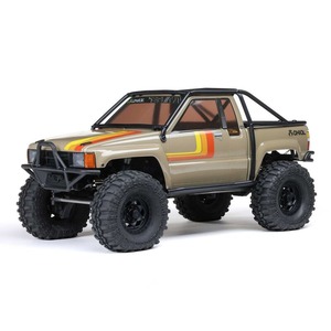 Axial SCX10 III 1/10 4WD <span class=keywords><strong>Rock</strong></span> Crawler 1987 SR5 <span class=keywords><strong>Hard</strong></span> Body Portal Axles 2-Speed Dig Transmission Brushed RTR RC Truck Rouge - Product Image 4
