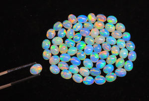 Atractiva Gema de Ópalo Etíope - Ópalos de Forma Ovalada de 9x7 mm - Cabujón de Ópalo Etíope Welo Galaxy Fire para Joyería - Product Image 5