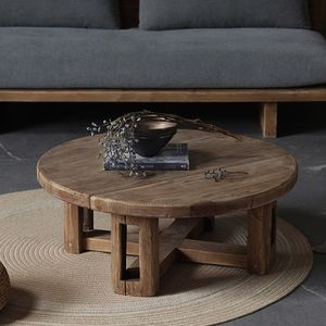 Table basse en bois au fini riche, conçue pour rehausser l'ambiance naturelle et chaleureuse du salon - Product Image 5