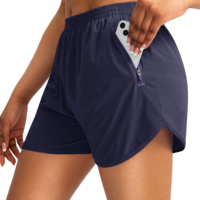 Pantalones cortos deportivos de gimnasio para mujer, pantalones holgados de tres cuartos para correr, pista y campo, forro de secado rápido, pantalones cortos antibrillo para mujer