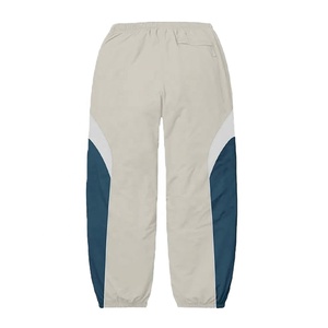 Survêtement unisexe en nylon 100% avec étiquette personnalisée survêtement de sport d'hiver avec taille élastique pantalon de survêtement ensemble de vestes coupe-vent - Product Image 6
