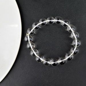 Bracelet en perles rondes de quartz clair de 10 mm - Cristal naturel pour l'amplification énergétique et la clarté - Product Image 4