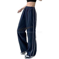Baggy Fallschirm hose mit weitem Bein Damen 100% Polyester Streetwear Jogging hose mit verstellbarem Saum Seiten taschen Elastischer Bund