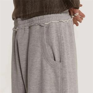 Pantalones de chándal holgados informales para hombre personalizados de fábrica OEM Color sólido Ligero para dobladillo Cintura elástica Algodón alto Pana unisex - Product Image 4