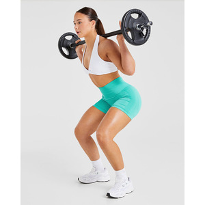 Sujetador deportivo de cuello Halter blanco personalizado con escote en V, detalle de espalda abierta y Sujetador deportivo de alto impacto para mujeres adultas - Product Image 5