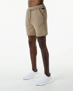 กางเกงขาสั้นผ้าฝ้ายเทอร์รี่สำหรับชายและหญิงทรงวินเทจซักด้วยกรดแบบออกแบบได้ตามต้องการ - Product Image 2