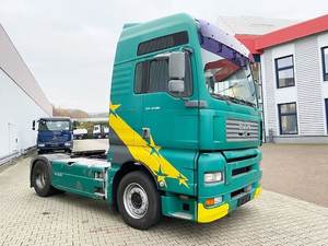 Camión MAN TGA 18.480 4x2 BLS XXL 2007 con cabina, hidráulica, climatización fija y pegatina verde - Product Image 2