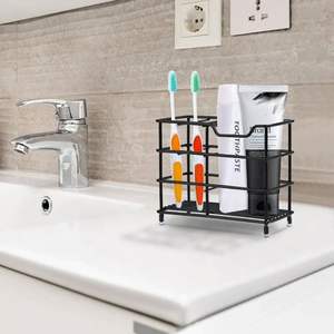 Porte-brosse à dents en métal au fini élégant, ajoutant une touche moderne à l'organisation de la salle de bain - Product Image 3