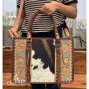 2025, venta al por mayor de fábrica, bolso grande de cuero genuino con borlas hechas a mano, bolsos cruzados informales de piel de vaca para mujer - Product Image 1