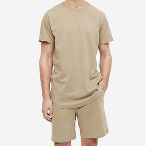 Conjunto de pantalones cortos y camiseta de corte regular 100% algodón para hombre, Color sólido en blanco, logotipo personalizado, bordado impreso, venta al por mayor, conjunto doble informal de verano - Product Image 5