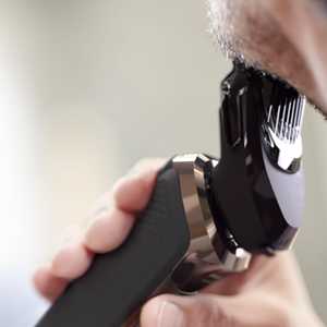 Rasoir électrique double lame pour homme, étanche IPX7, utilisation humide et sèche, avec fonctions rotative et à grille, lavable, version allemande - Product Image 1