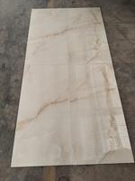 Carreaux de sol en porcelaine haute brillance 600x1200mm, style moderne et luxueux, Aesenia Onyx Beige avec texture imitation marbre