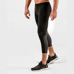 Vente en gros Leggings solides de yoga taille moyenne pour hommes pantalons de compression athlétiques pour vêtements de fitness et de yoga - Product Image 1
