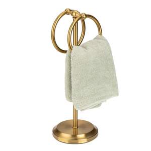 Rustic brass <b>towel</b> stand complementing traditional washrooms with artisanal metal craftsmanship - Product Image 2