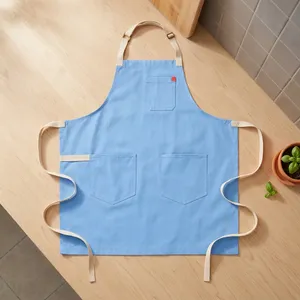 Delantal Clásico Azul Resistente y Duradero, Reutilizable, con Tres Bolsillos, Tejido de Algodón, Lavable a Máquina, para Limpieza y Uso Diario - Product Image 1