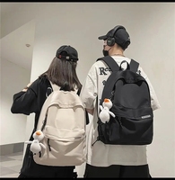 Sac à dos noir pour hommes, sac de voyage simple en nylon, sac à dos pour couple, sac pour étudiants